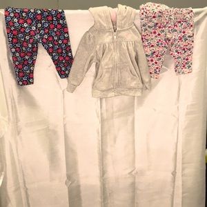 Baby  1 button ruffle 1 regular  a hooded sweater